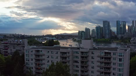 Moody-Drone-Aerial-Shot-Over-the-Vancouver-Marina-During-Sunset,-British-Columbia,-Canada