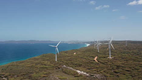 Aerial-view-of-wind-power-turbines,-in-Albany,-Australia---rising,-Drone-shot