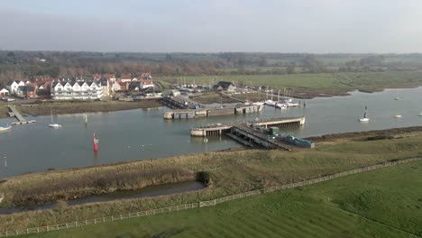 Colne-Tide-Barrier-Wivenhoe,-England-4K-Drone-footage-low-point-of-view