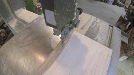 Using-a-bandsaw-to-cut-a-board