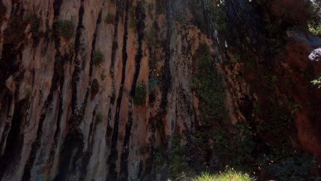Close-tilting-up-shot-of-Weeping-Rock-at-Zion-National-Park