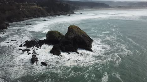 aerial-footage-of-storm-surge-hitting-rocks-on-coast