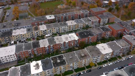 Aerial-shot-over-apartment-building-and-showing-a-public-park