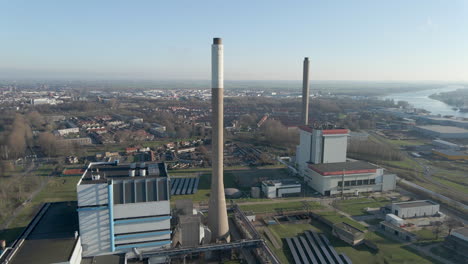 Aerial-of-high-chimneys-of-power-plant-on-an-industrial-terrain