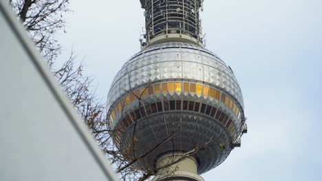 Close-Up-of-Impressive-Cupola-and-Antenna-of-TV-Tower-in-Berlin-City