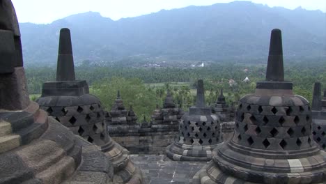 Decorated-Buddhist-stone-stupas-religious-from-Borobudur-Temple,-UNESCO-World-Heritage-Site,-Central-Java,-Indonesia,-Buddhist-Temple