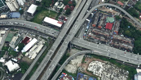 Aerial-Shot-Of-Cars-Driving-On-City-Roads-And-Infrastructure-In-Kuala-Lumpur,-Malaysia