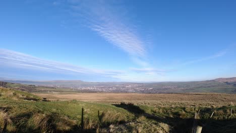 Rural-Lancashire-countryside-blue-sky-light-cloud-timelapse-meadow-scenic-landscape