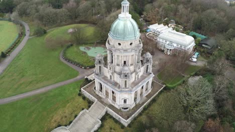 Aerial-view-landmark-historical-copper-dome-building-Ashton-Memorial-English-countryside-descending-tilt-up