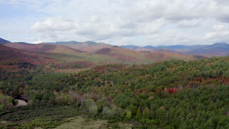 Wide-Sweeping-Aerial-View-of-a-Vast-Forest-in-the-Adirondack-Mountains-During-The-Fall-Time