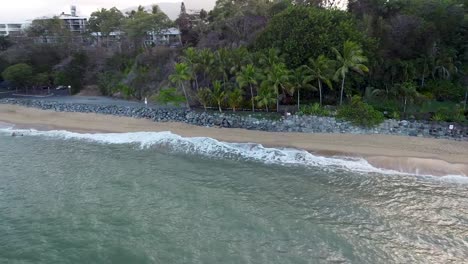 Aerial-Of-Waves-Breaking-On-Trinity-Beach-In-Cairns