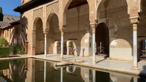 Slow-tilt-yp-of-the-Partal-Palace-in-the-nasrid-gardens-of-the-Alhambra