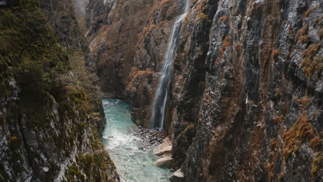 Aerial-Drone-View-of-Valle-di-Scalve-Water-Cascade-Streaming-Down-the-Wet-Rocky-Cliff