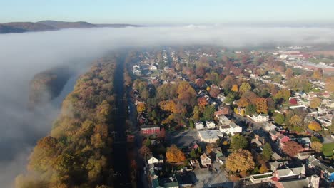 Airplane-view-of-thick-fog-cloud-over-American-neighborhood