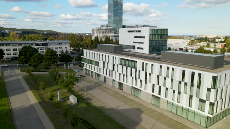 Aerial-backwards-flight-over-modern-Oliwa-Campus-of-University-in-Gdansk,Poland