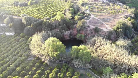 Aerial-4k-footage-of-the-landscape-around-the-Pego-Do-Inferno-waterfall-in-Portugal