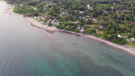Tranquil-Beach-Resort-In-The-Island-Of-Negros-With-Pristine-Turquoise-Blue-Clear-Water---Negros-Oriental,-Philippines---aerial-drone