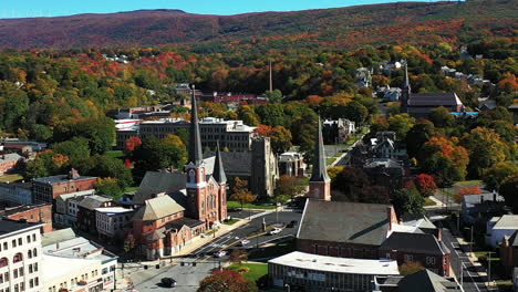 Aerial-View,-North-Adams-Historic-Downtown,-Massachusetts-USA,-Fist-Baptist-Church-and-Cityscape-on-Sunny-Autumn-Day