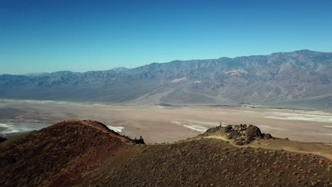 Aerial-Shot-Of-A-Tourist-On-Dante's-View-Lookout-In-Death-Valley-National-Park,-California