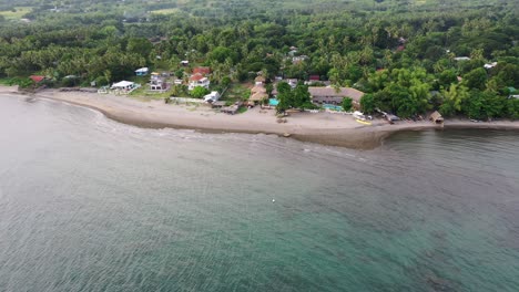 Drone-Flying-Towards-Beautiful-Beach-On-Tropical-Island-In-Negros-Oriental,-Philippines---aerial