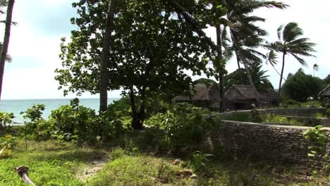 Wooden-huts-of-a-fishermen-village-on-Fanning-Island,-Republic-of-Kiribati