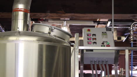 Freshly-brewed-hot-beer-foams-in-the-brewing-tank