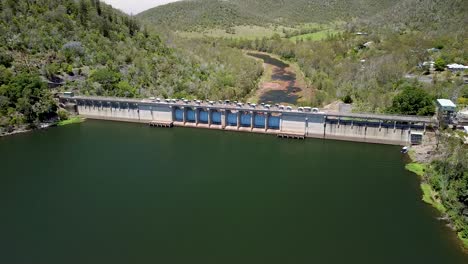 Aerial-Over-Stanley-River-Going-Past-Somerset-Dam-In-View