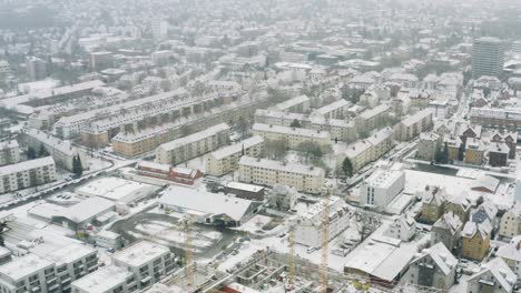 Drone-Aerial-views-of-the-student-town-Göttingen-during-winter-in-heavy-snowfall