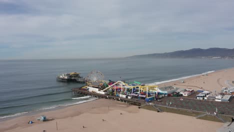 Panning-aerial-shot-of-the-Santa-Monica-Pier-closed-down-due-to-the-COVID-19-pandemic