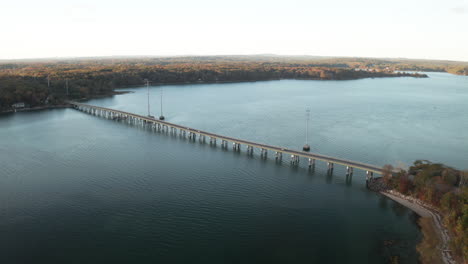 Aerial-Fly-over-Footage-overlooking-Cousins-Island-Maine-Bridge-Power-Lines