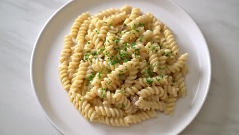 spirali-or-spiral-pasta-mushroom-cream-sauce-with-parsley---Italian-food-style