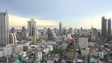 Pan-of-the-modern-skyline-of-Bangkok,-Thailand