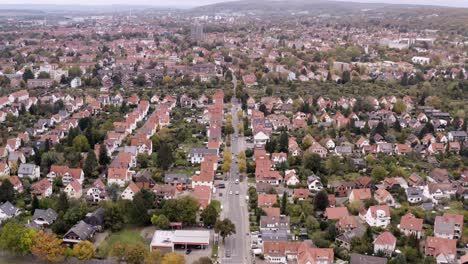 Drone-circling-over-typical-german-buildings-in-a-small-city-in-autumn