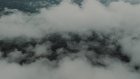 Drone-aerial-view-of-clouds-over-the-forest-in-Guatemala