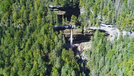 Wide-drone-shot-of-Pericnik-Waterfall-in-Triglav-National-Park,-Slovenia