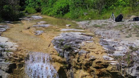 Aerial-shot-above-scenic-waterfall-on-summer-day