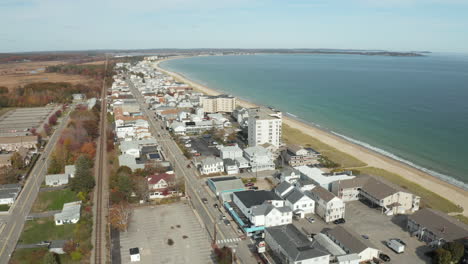 Aerial-drone-shot-of-Old-Orchard-Beach-Maine-coastline-in-autumn