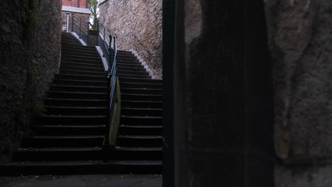 moving-left-dolly-shot-of-a-stoned-stairs-a-the-south-entrance-of-the-pere-lachaise-cemetary