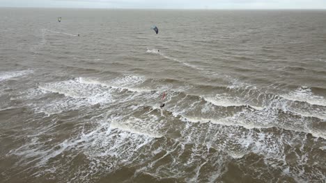 Windsurfers-and-kite-surfers-Clacton-on-sea-Essex-uk-aerial-footage