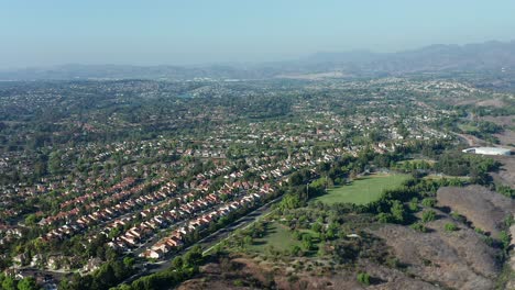 Aerial-View-over-housing-and-a-park-in-Mission-Viejo,-California