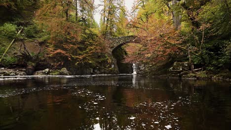 Beautiful-autumn-scene-at-The-Hermitage,-Dunkeld-in-the-Scottish-Highlands--Static-shot