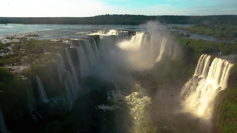Aerial---Devil's-Throat-in-Iguazu-Falls,-Argentina,-wide-rising-shot