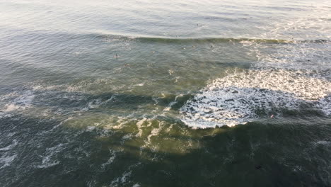 Aerial-view-of-Surfers-at-Santa-Cruz-Beach-California-shot-in-4k-high-resolution