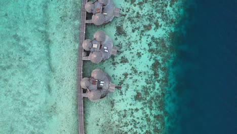 Top-view-of-blue-lagoon,-Maldives-island-resort