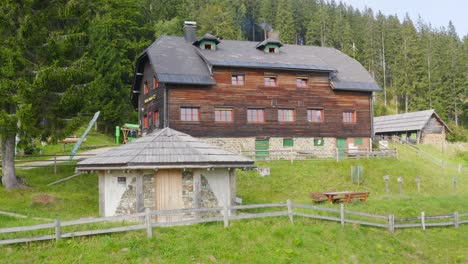 Aerial-side-view-of-Alpine-lodge