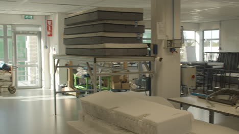 Pan-over-mattress-making-workshop-with-machines-for-testing-and-production