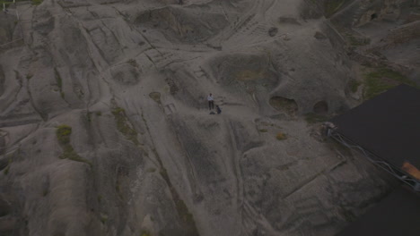 Returning-drone-shot-above-the-Vardzia-cave-town