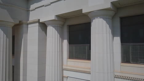 Backward-dolly-shot-of-the-barricaded-windows-of-the-Georgia-courthouse