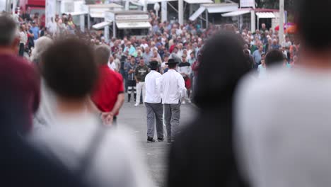 Crowd-Of-People-Watching-Bullfighting-By-Rope-On-The-Street-In-The-Island-Of-Terceira,-Azores,-Portugal