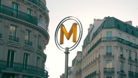 Main-symbol-"M"-in-yellow-color,-from-the-metro-system-of-Paris,-France